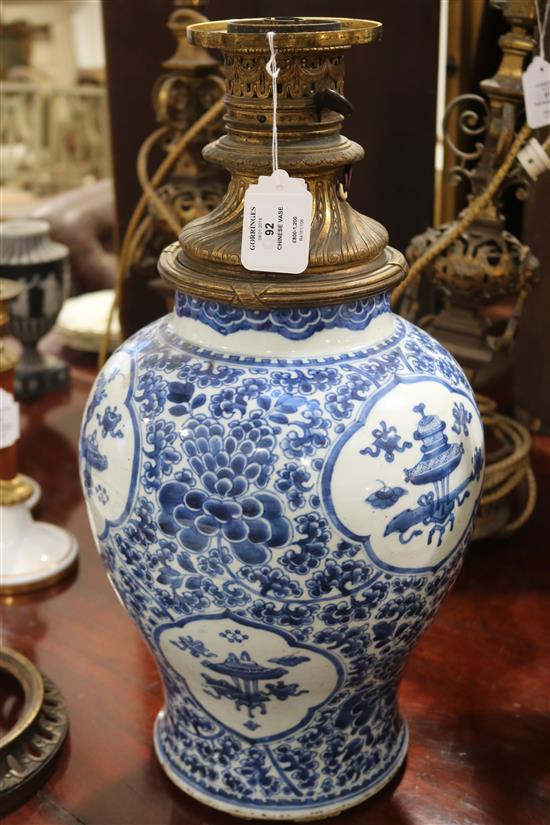 A Chinese blue and white antiques and lotus vase, Qing dynasty, Kangxi period, height 13.75in.